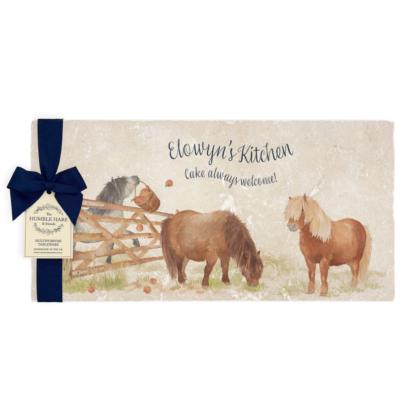 A personalised marble sharing platter featuring cheeky Shetland ponies in a watercolour style, packaged with a luxurious dark blue bow and branded gift tag.