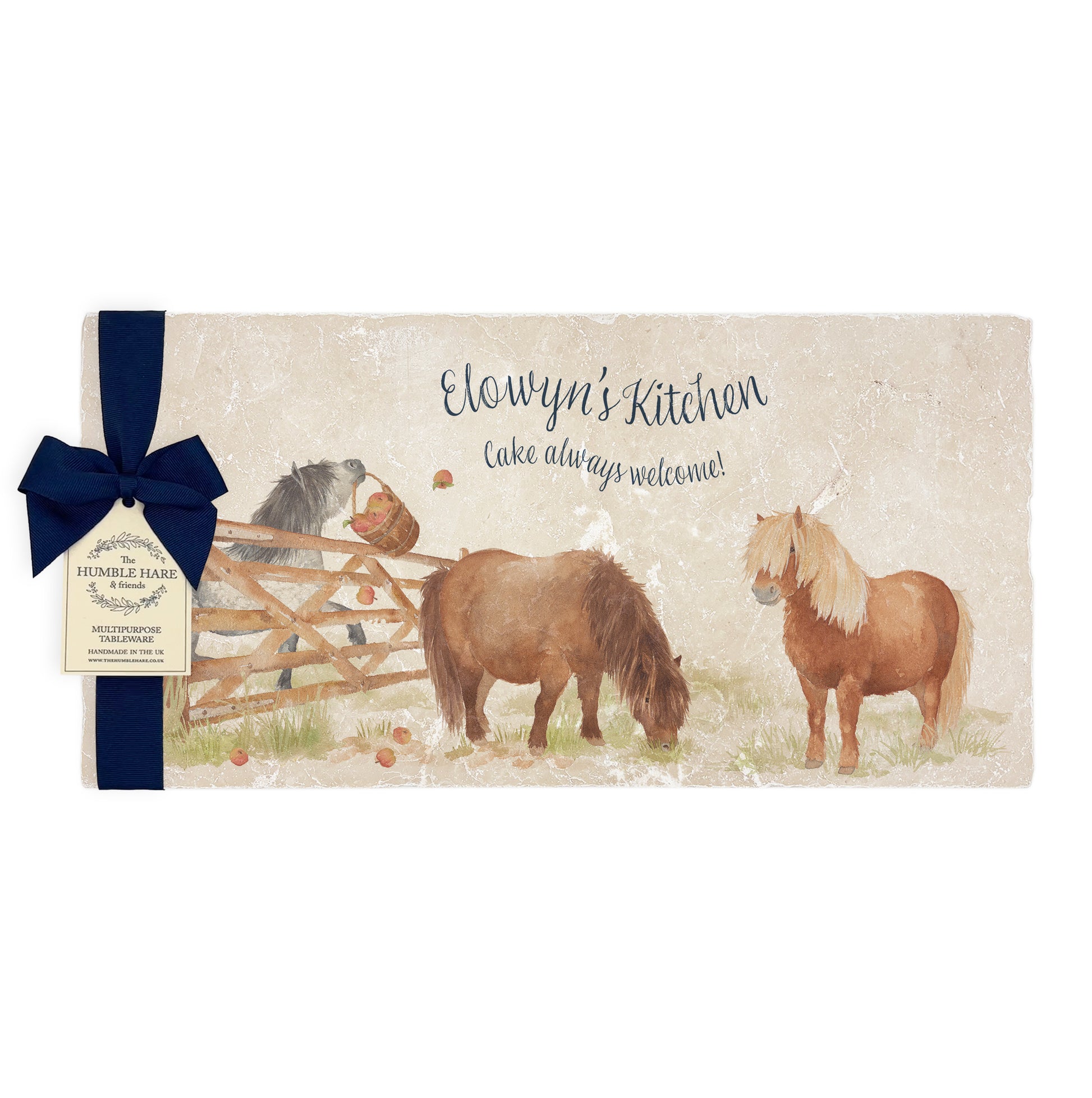 A personalised marble sharing platter featuring cheeky Shetland ponies in a watercolour style, packaged with a luxurious dark blue bow and branded gift tag.