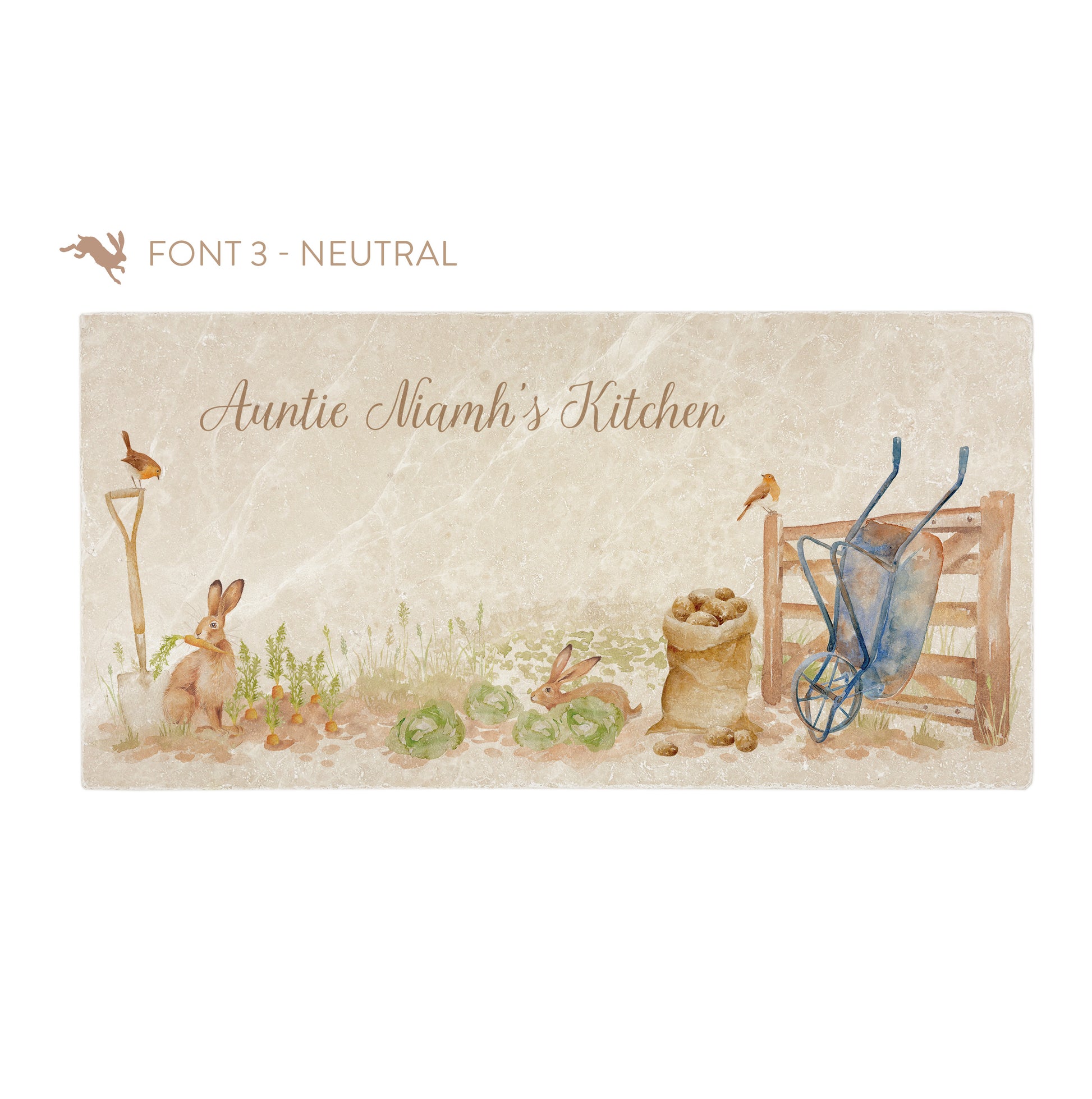 A personalised rectangular marble sharing platter featuring hares and robins in a vegetable patch in a watercolour style. The example personalised neutral colour text reads ‘Auntie Niamh's Kitchen’ in a brush script font.