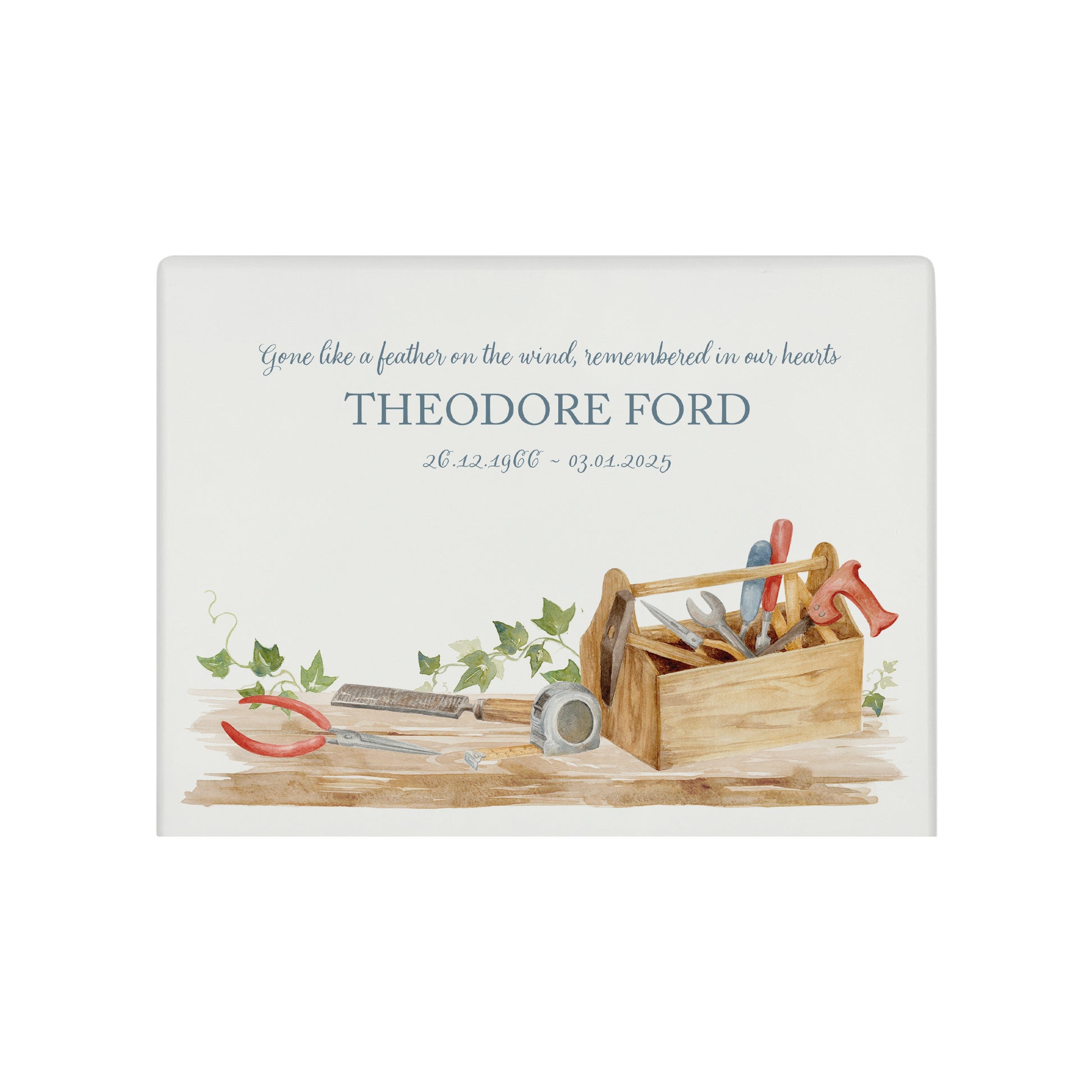 A beautifully crafted solid wooden urn, finished in white with a soft watercolour design of a Tool box on a shelf, perfect for Dad, brother, uncle, Grandad who loved his workshop. Thoughtfully made for either display or burial, this personalised urn can be customised to create a meaningful memorial. Perfect for holding ashes of a loved one or a beloved pet, it serves as a comforting tribute and keepsake.