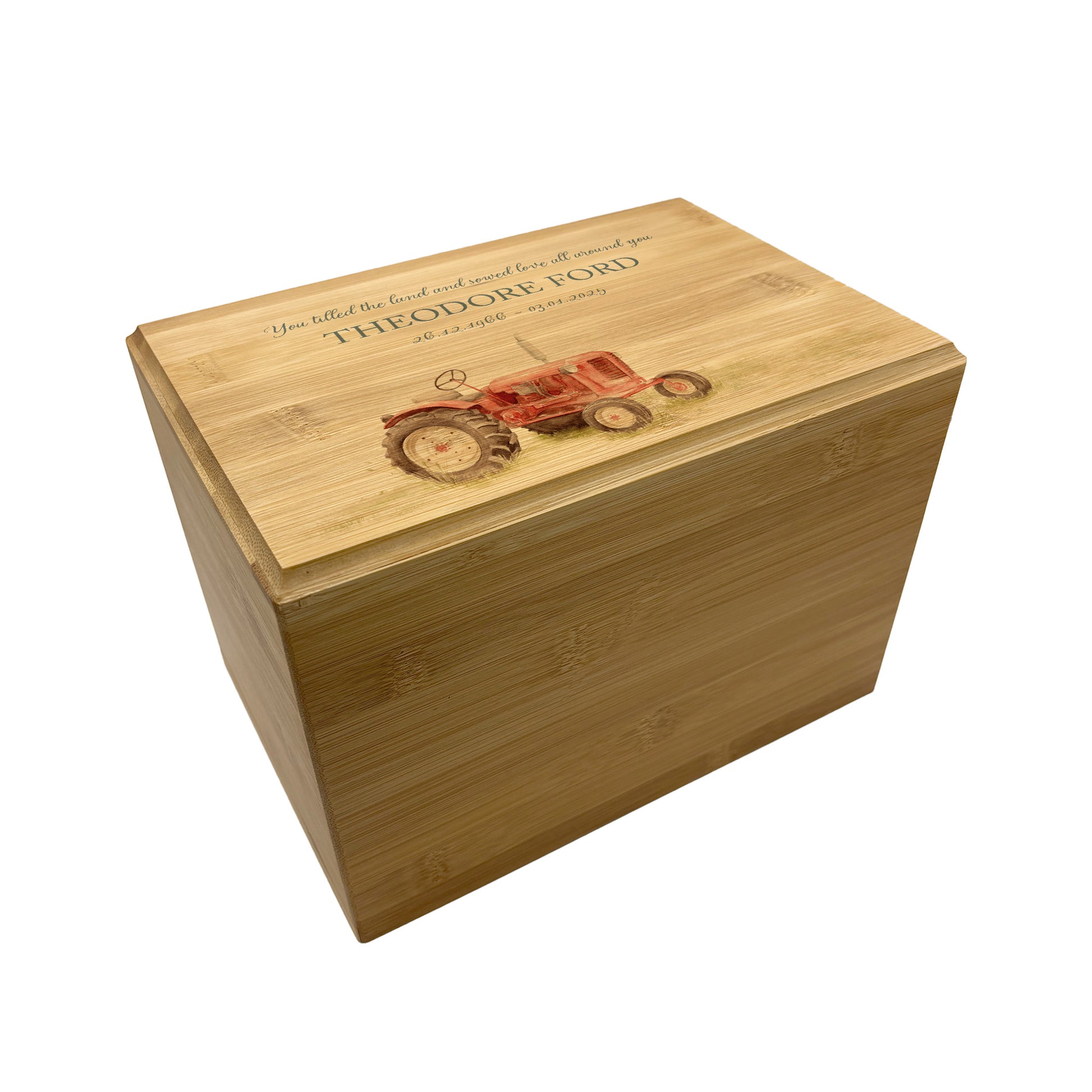 A beautifully crafted solid Bamboo wooden urn, personalised and finished with a soft watercolour design of a Farmers Tractor,  Great for Dad, Grandad, Brother, Son, Uncle.  Thoughtfully made for either display or burial, this personalised urn can be customised to create a meaningful memorial. Perfect for holding ashes of a loved one or a beloved pet, it serves as a comforting tribute and keepsake.