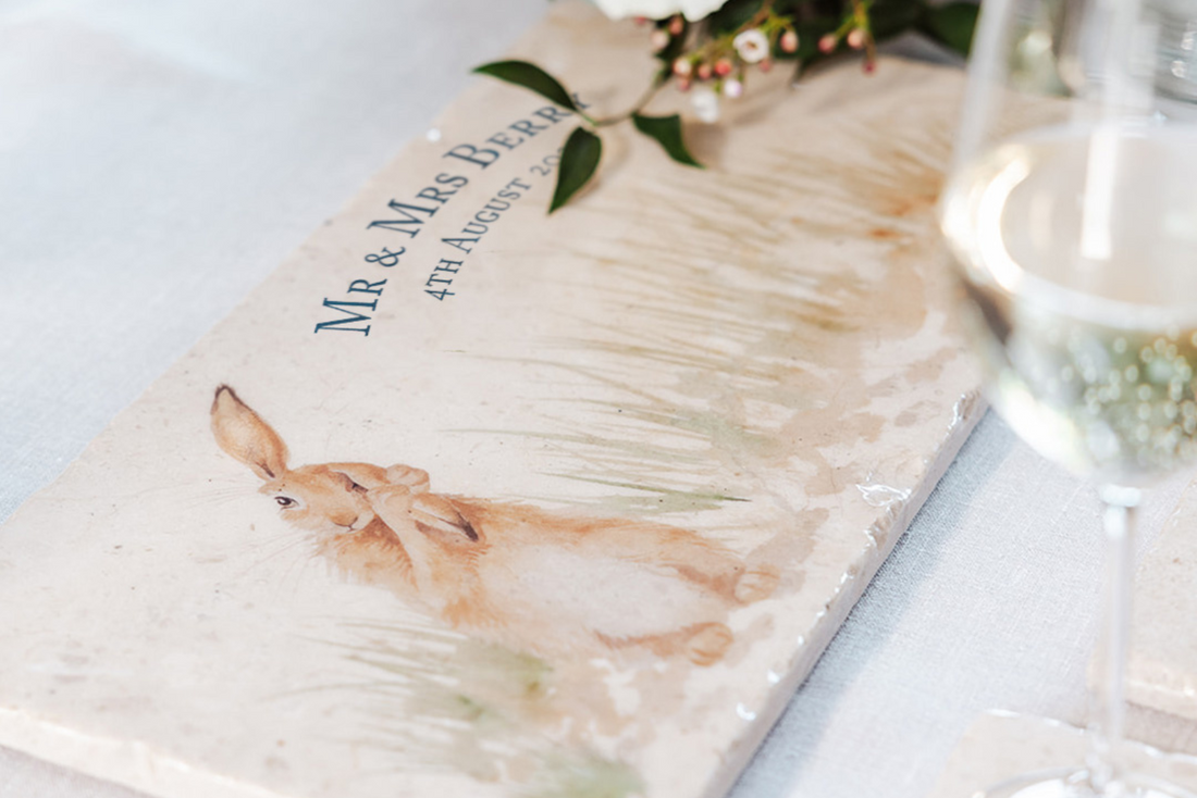 A personalised marble sharing platter placed on a country farmhouse table