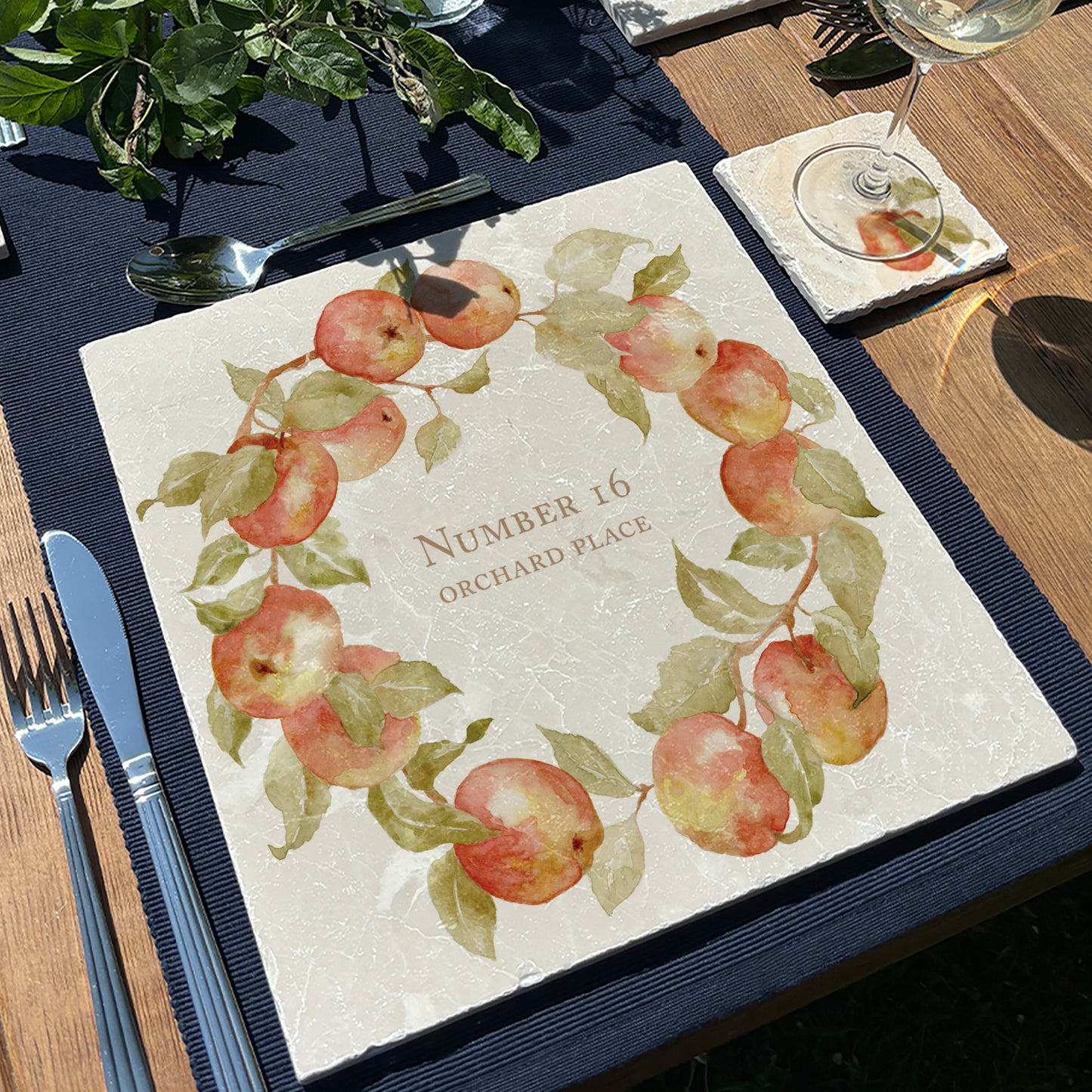 A personalised marble large platter with an apple wreath watercolour design. Create a personalised placemat, serving platter, trivet or cheeseboard as a luxury gift.