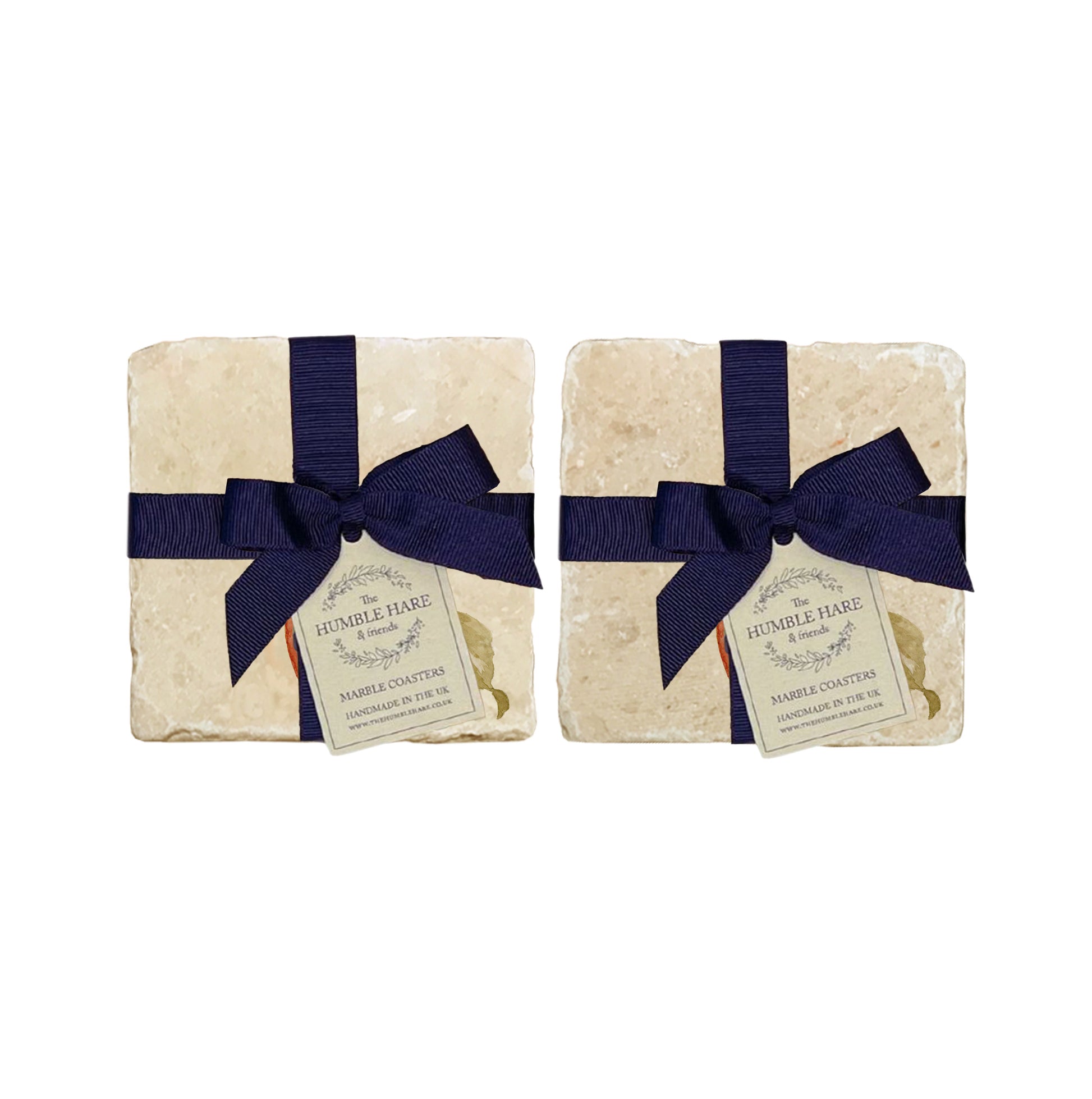 A set of 4 handmade marble coasters featuring a single watercolour apple, packaged in 2 pairs, with a luxurious blue bow and gift tag.