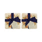 A set of 4 handmade marble coasters featuring a vintage watercolour apple wreath design, packaged in 2 pairs, with a luxurious blue bow and gift tag.