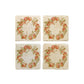 A set of 4 square marble coasters, featuring a rustic watercolour apple wreath.