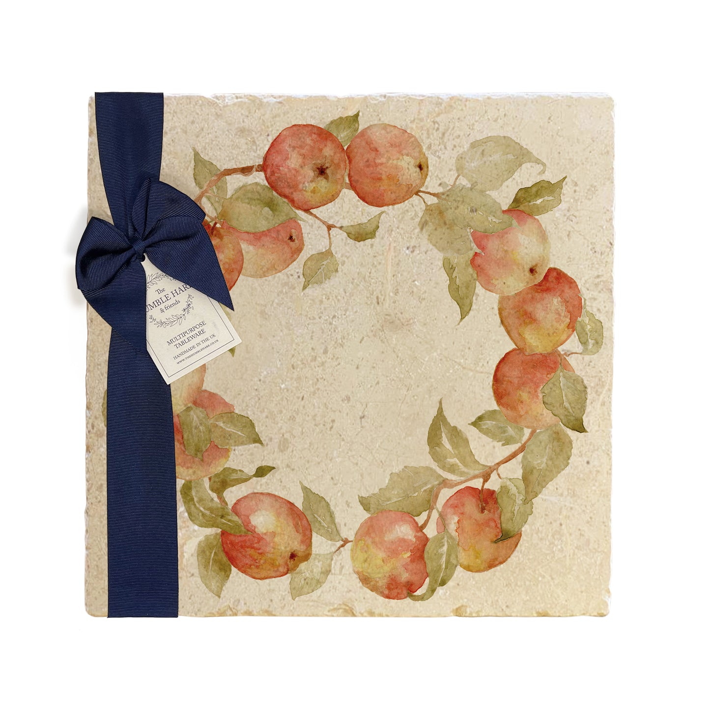 A large multipurpose marble platter with a watercolour apple wreath design, packaged with a luxurious dark blue bow and branded gift tag.