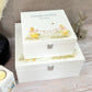 A white wooden keepsake box featuring a sweet baby ducklings design, personalised with custom text. Choose from two sizes, medium and large.
