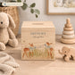 handmade nursery decor featuring wooden baby money box with watercolour design, sweet baby twin fawns. 