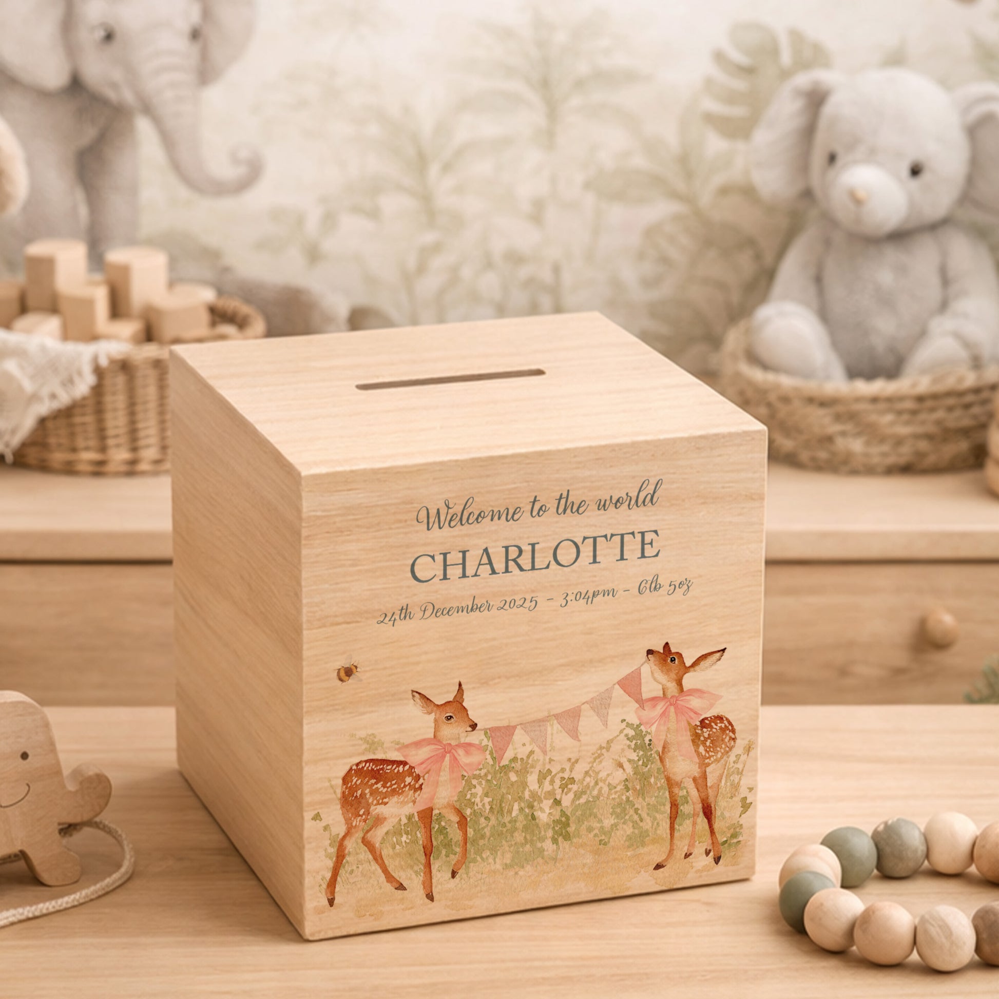 handmade nursery decor featuring wooden baby money box with watercolour design, sweet baby twin fawns. 