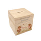 personalised watercolour money box handmade for christening keepsake, sweet highland cow babies playing in a field with bunting with bows around their necks