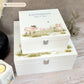 A white wooden keepsake box featuring a sweet baby lambs design, personalised with custom text. Choose from two sizes, medium and large.