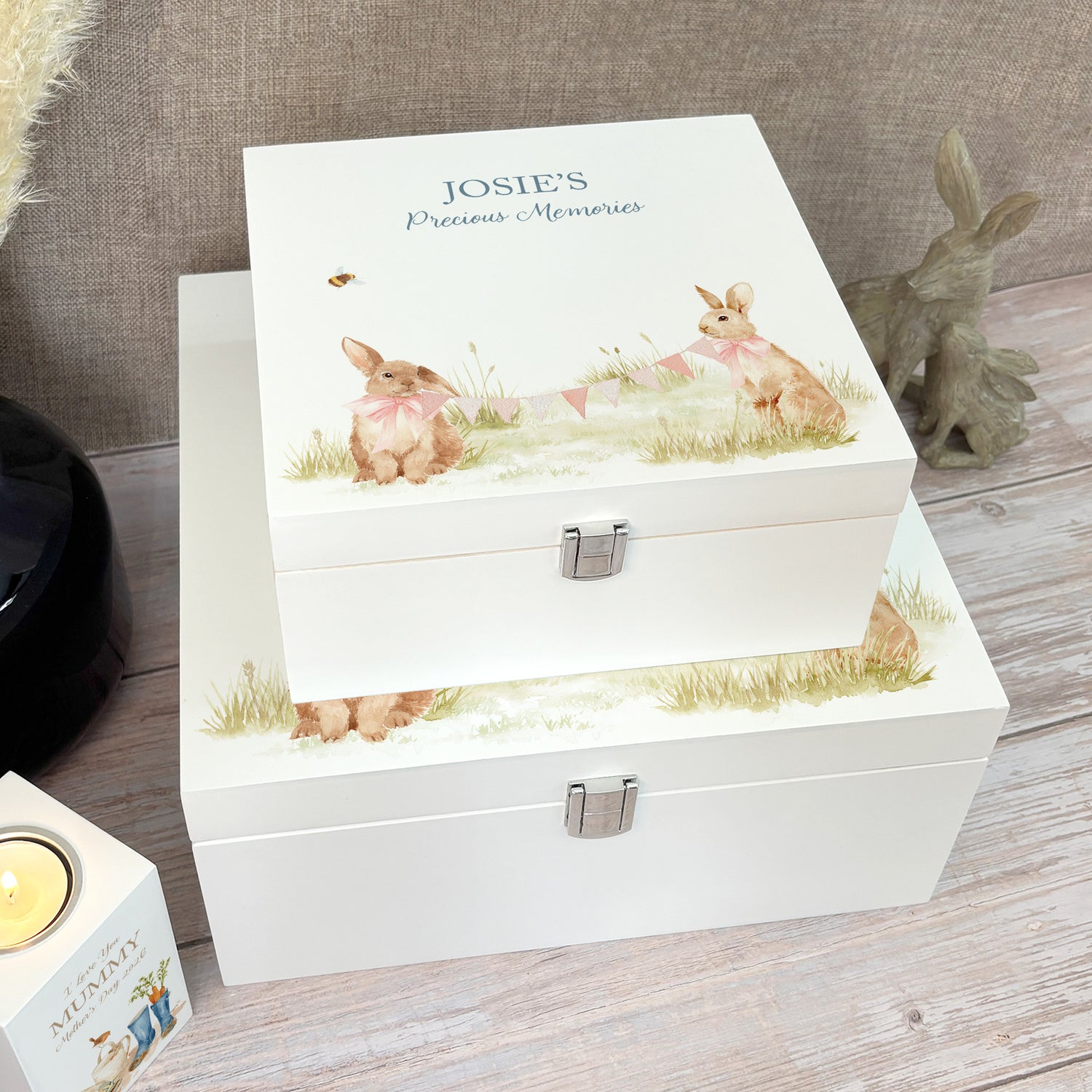 A white wooden keepsake box featuring a sweet baby bunny design, personalised with custom text. Choose from two sizes, medium and large.