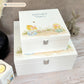 A white wooden keepsake box featuring a sweet baby chicks design, personalised with custom text. Choose from two sizes, medium and large.