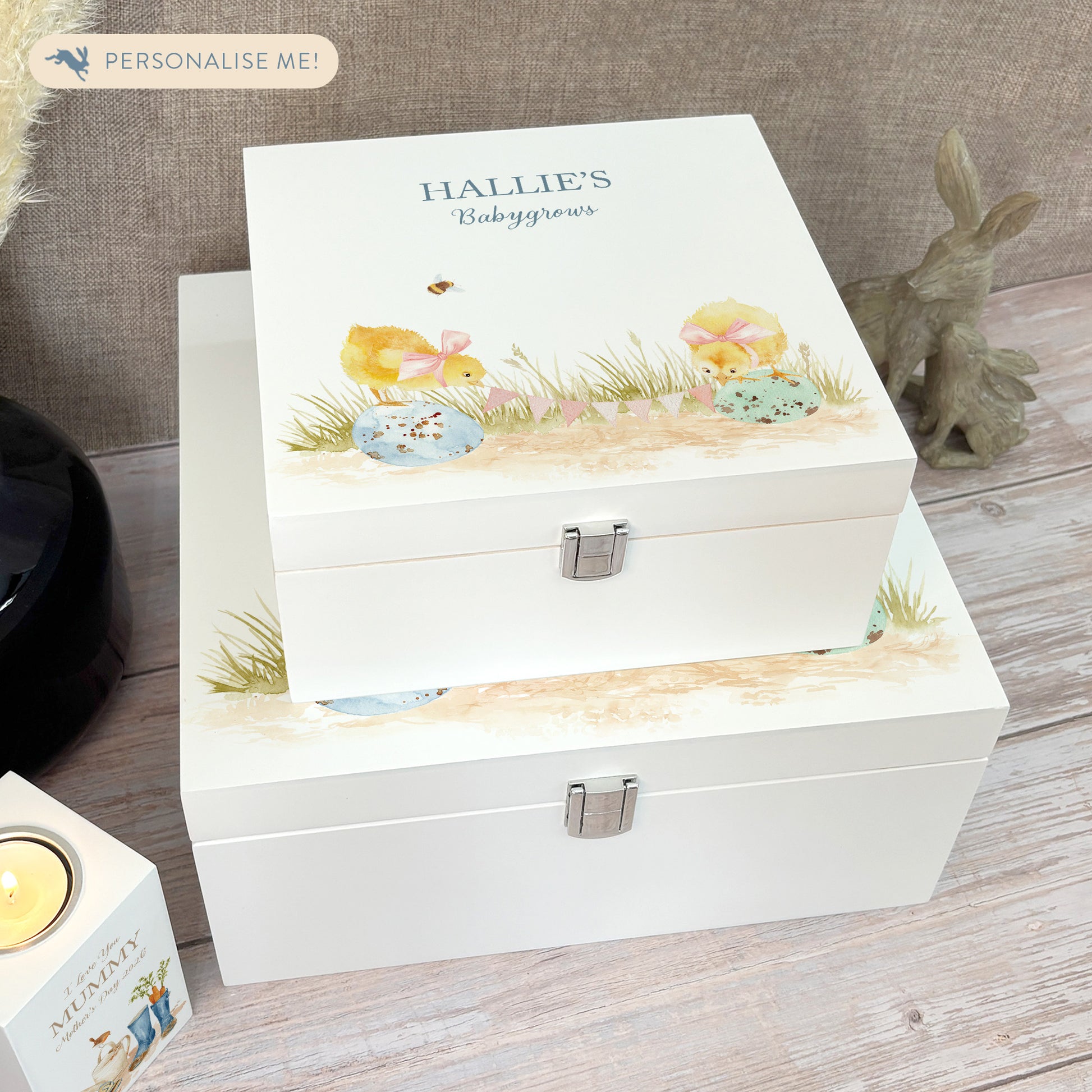 A white wooden keepsake box featuring a sweet baby chicks design, personalised with custom text. Choose from two sizes, medium and large.