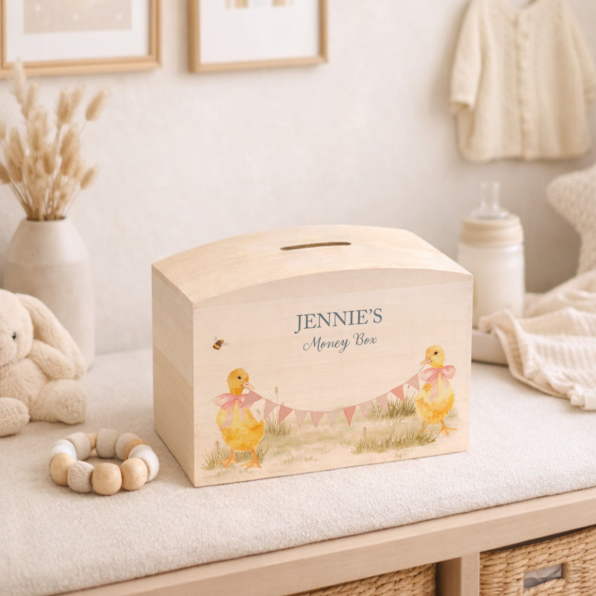 Ducklings with bunting and bows in a water colour design, the perfect money box for your little savers. Newborn, birthday and christening gift. 