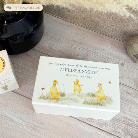 Luxury solid wooden white painted Urn ,  Featuring Baby Ducklings, A watercolour illustration, our urns and Caskets for displaying or burying ashes. Customisable and can be personalised. Perfect funeral memory keepsake urn, for storing ashes for humans and pets. Coping with baby loss, baby memorial