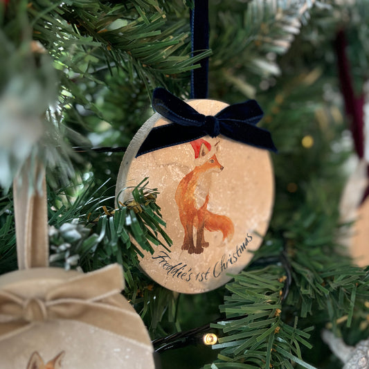 Capture the spirit of the great outdoors with our oval-shaped marble baubles. Each bauble is decorated with a watercolour fox and finished with a velvet ribbon, available in your choice of colour. Personalisation is also available to create a unique, memorable keepsake.