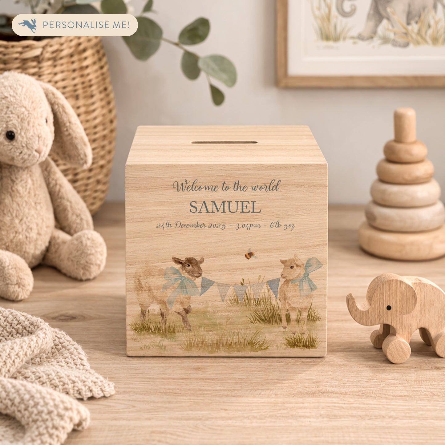 wooden handmade baby money box styled in a neutral childrens bedroom, cute lambs playing with bunting and bows around their necks