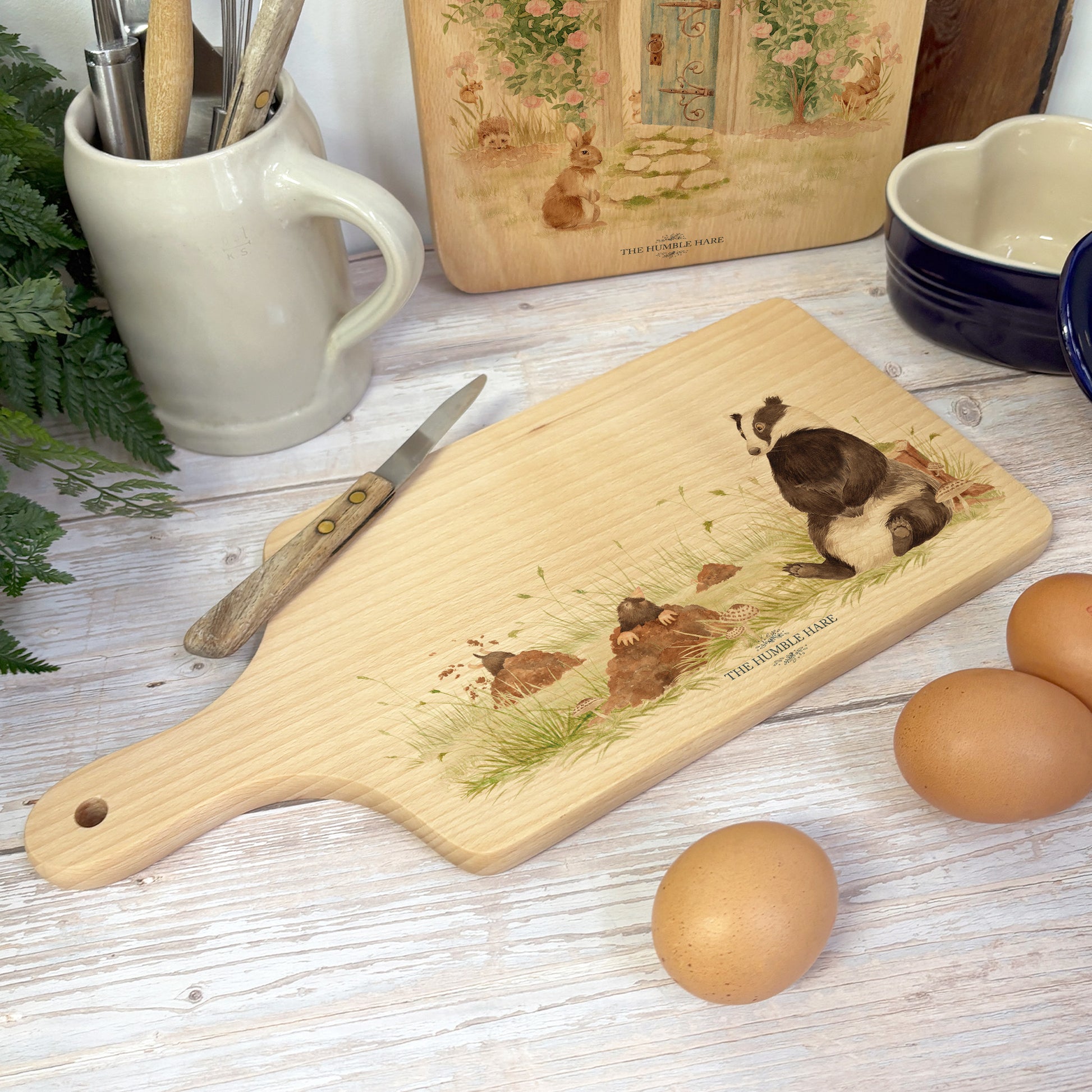 Badger and mole water colour paddle chopping board