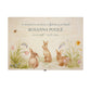 Wooden box with rabbit illustration on a wooden background. Wooden box with a decorative lid featuring animal illustrations on a wooden background. Perfect funeral memory keepsake box, for storing ashes, order of service, flowers, pictures. 