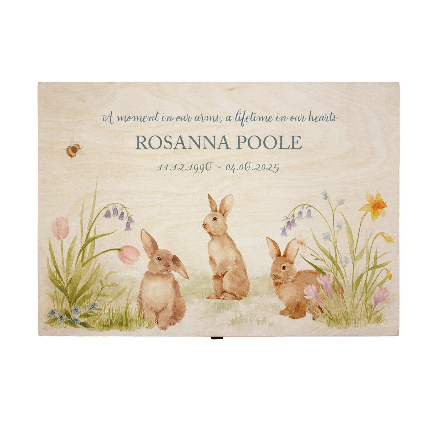Wooden box with rabbit illustration on a wooden background. Wooden box with a decorative lid featuring animal illustrations on a wooden background. Perfect funeral memory keepsake box, for storing ashes, order of service, flowers, pictures. 