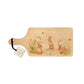 watercolour bunny design in a meadow. This watercolour design chopping board makes a great gift.  
