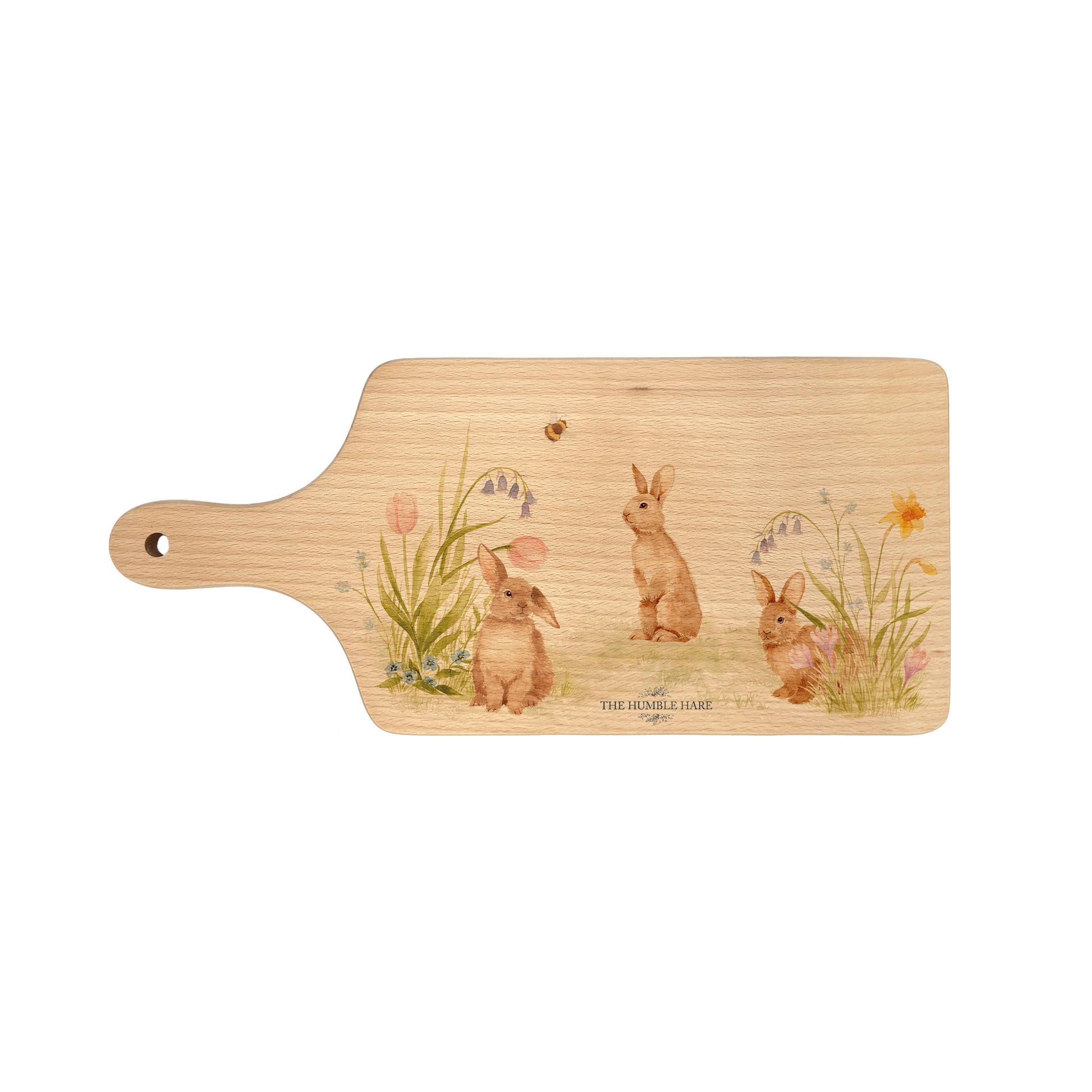 watercolour bunny design in a meadow. This watercolour design chopping board makes a great gift.  