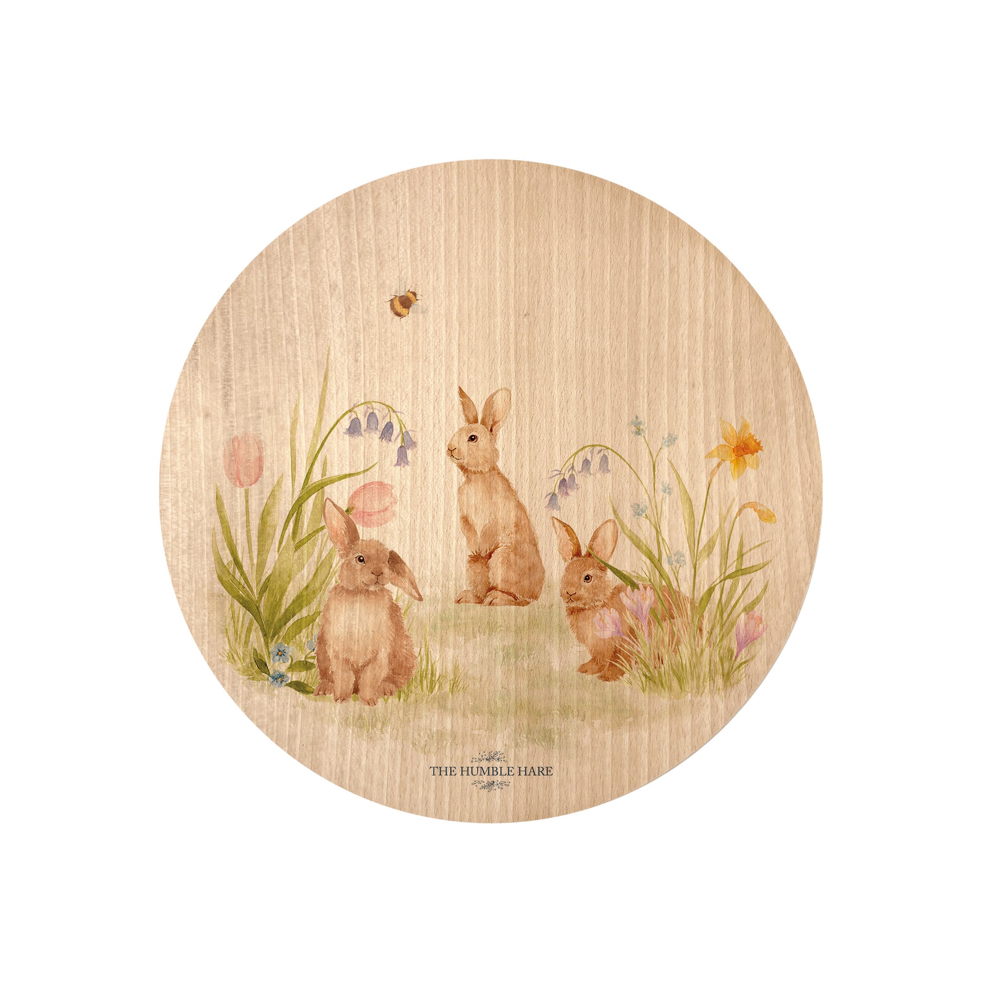 Round beech wood chopping board featuring our blooming bunnies woodland animal design, with rabbits among spring flowers.