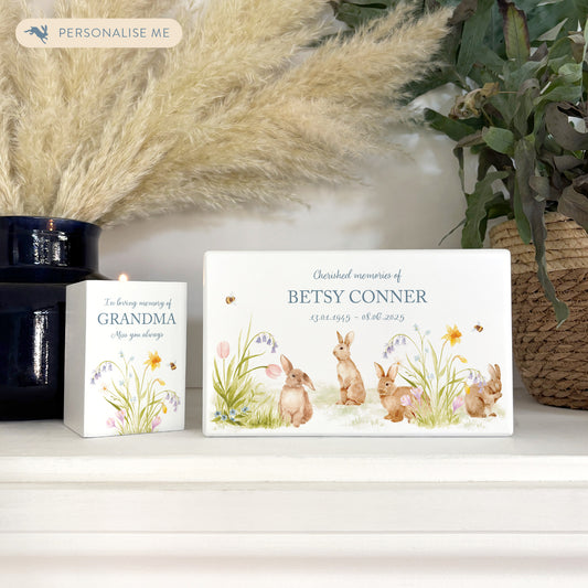 Luxury solid wooden white painted Urn ,  Featuring Bunnies in a flower meadow with buzzy bees, A watercolour illustration, our urns and Caskets for displaying or burying ashes. Customisable and can be personalised. Perfect funeral memory keepsake urn, for storing ashes for humans and pets. 