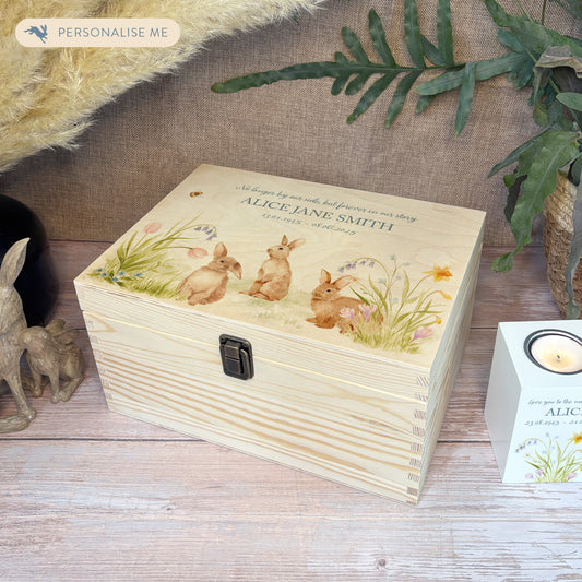 Wooden box with a decorative lid featuring animal illustrations on a wooden background. Perfect funeral memory keepsake box, for storing ashes, order of service, flowers, pictures. 