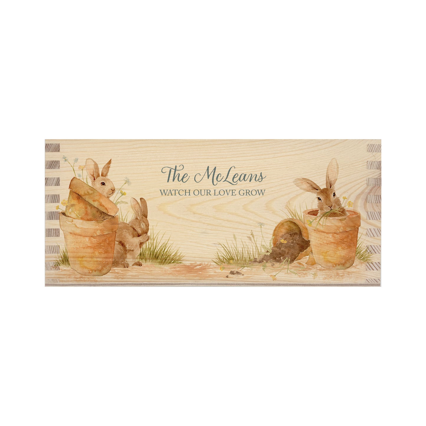 A rectangle wooden planter box with a watercolour design of cute bunny rabbits in plant pots. The planter can be personalised with a name and a selection of custom phrases to suit any occasion including birthday, wedding, anniversary, engagement, and new home.
