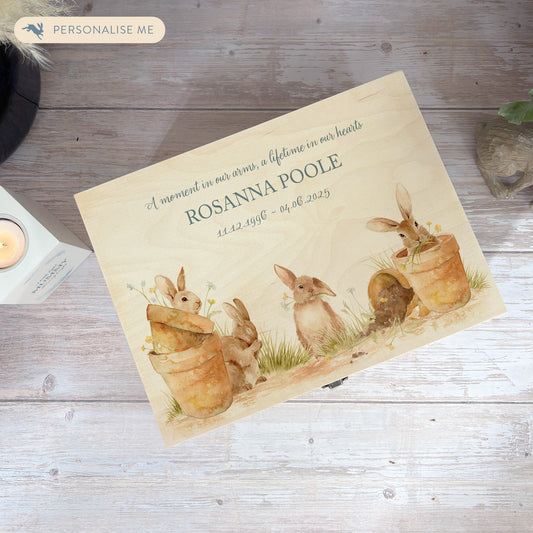 Wooden box with a decorative lid featuring animal illustrations on a wooden background. Perfect funeral memory keepsake box, for storing ashes, order of service, flowers, pictures. 