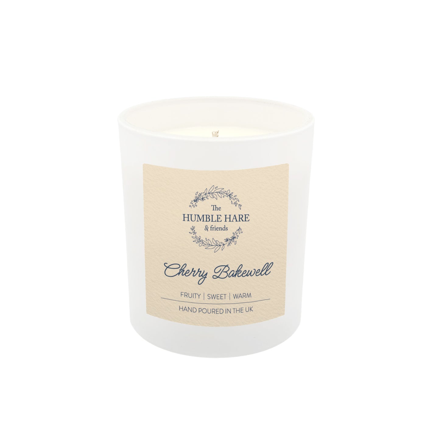 A white glass jar candle with a cream-colored label reading 'The Humble Hare & friends' and 'Cherry Bakewell', shown on a plain white background.