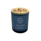 A dark blue glass jar candle with a light wood lid featuring donkeys lined up along a fence. The candle is The Humble Hare's Cosy Fireside scent, with vanilla, spices and tobacco leaf notes.