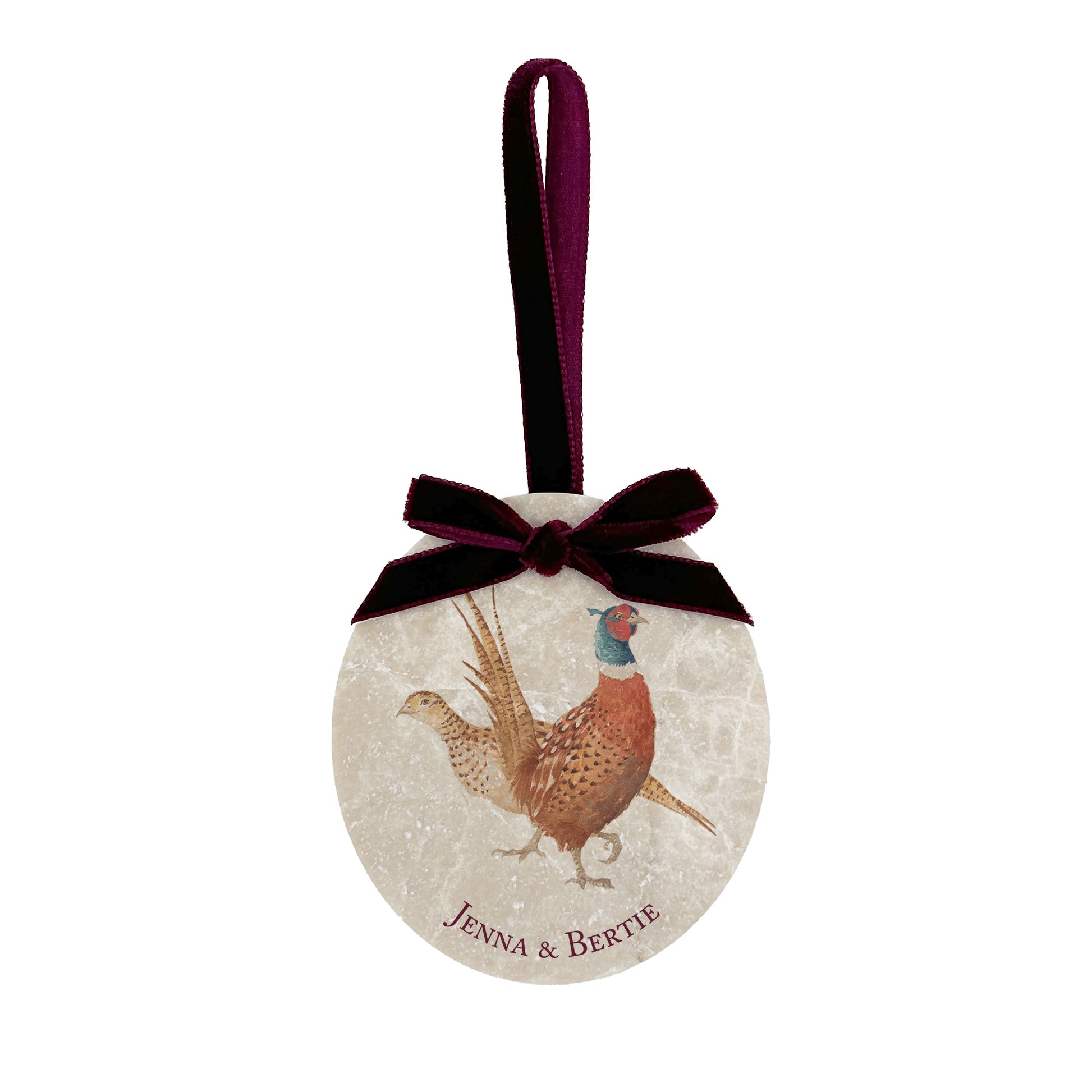 An oval marble bauble featuring a watercolour pheasant couple, personalised to celebrate the couple’s first Christmas as Mr and Mrs. The bauble is finished with a velvet ribbon.