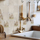 A rustic country kitchen with marble splashback tiles featuring a dalmatian dog design.