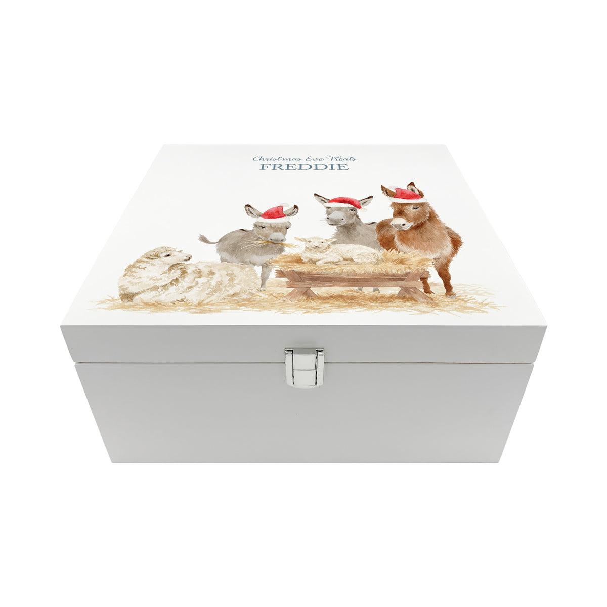 The front of a white wooden Christmas Eve gift box with a donkey away in a manger watercolour illustration, the box is personalised with a name