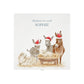 The top of a white wooden Christmas Eve gift box with a donkey away in a manger watercolour illustration, the box is personalised with a name
