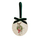 An oval marble Christmas ornament with a green velvet ribbon loop and bow, featuring a vintage-style illustration of a donkey wearing a green wreath and red bow.