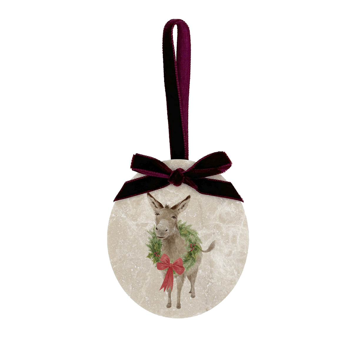 An oval marble Christmas ornament with a burgundy red velvet ribbon loop and bow, featuring a vintage-style illustration of a donkey wearing a green wreath and red bow.