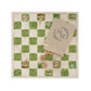 A marble chess, draughts or checkers board with a small cotton bag full of wooden counters featuring British birds.