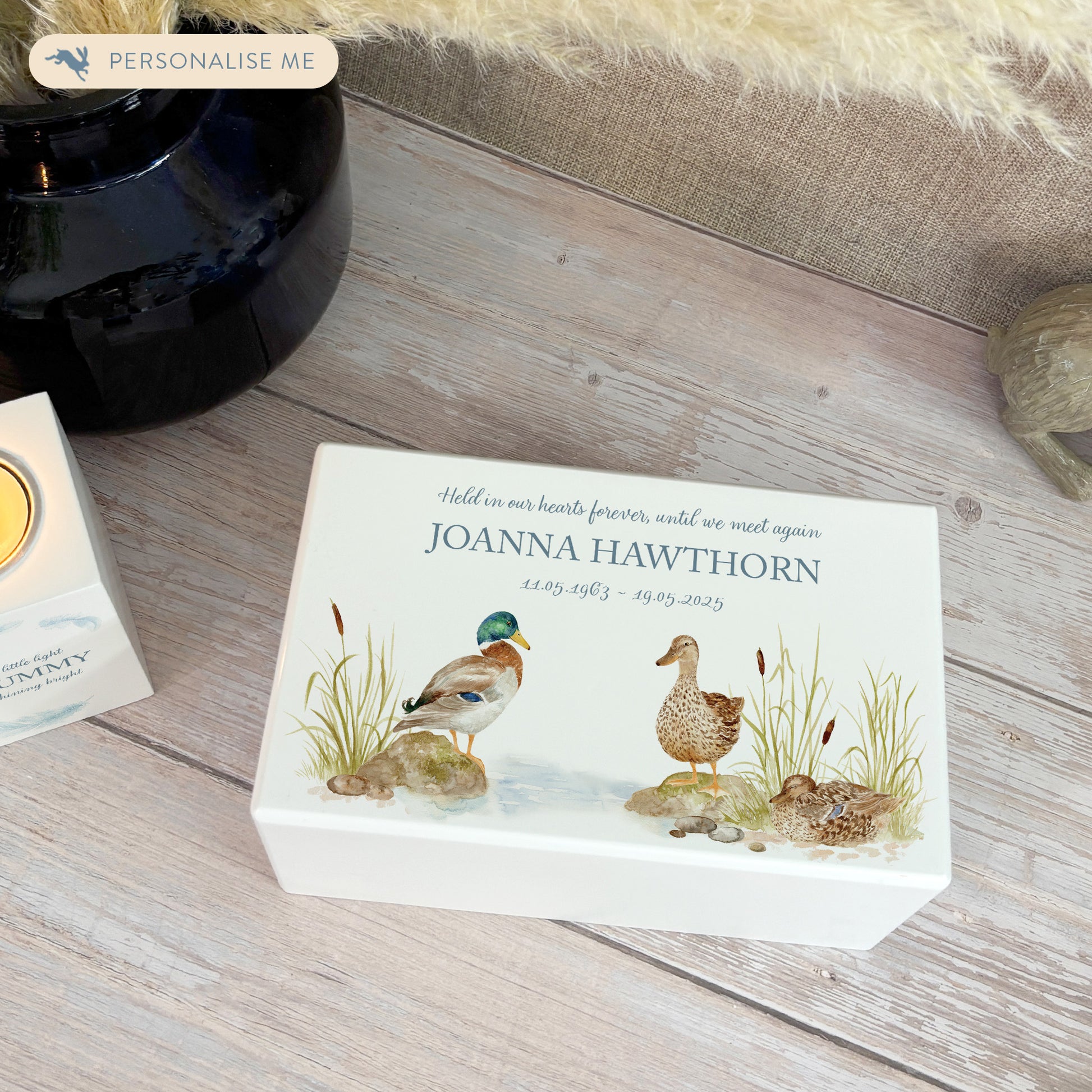 Luxury solid wooden white painted Urn ,  Featuring Ducks on a bank. A watercolour illustration, our urns and Caskets for displaying or burying ashes. Customisable and can be personalised. Perfect funeral memory keepsake urn, for storing ashes for humans and pets. 