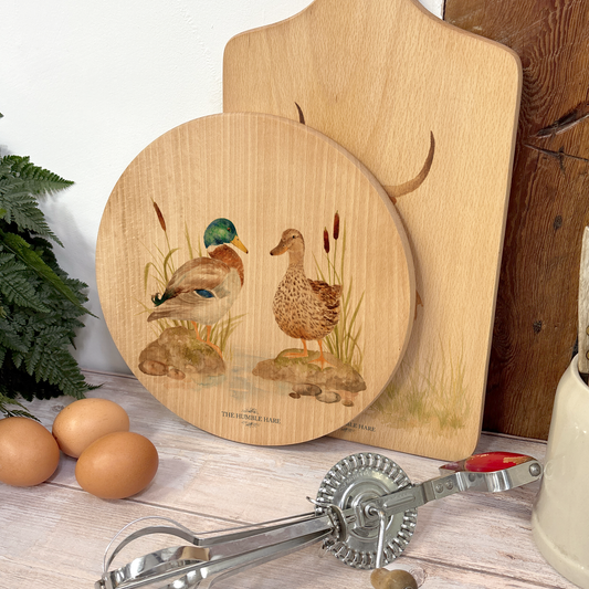 Rustic Beechwood chopping board with countryside-style Mallards sitting on a  river bank illustration and luxury blue ribbon.