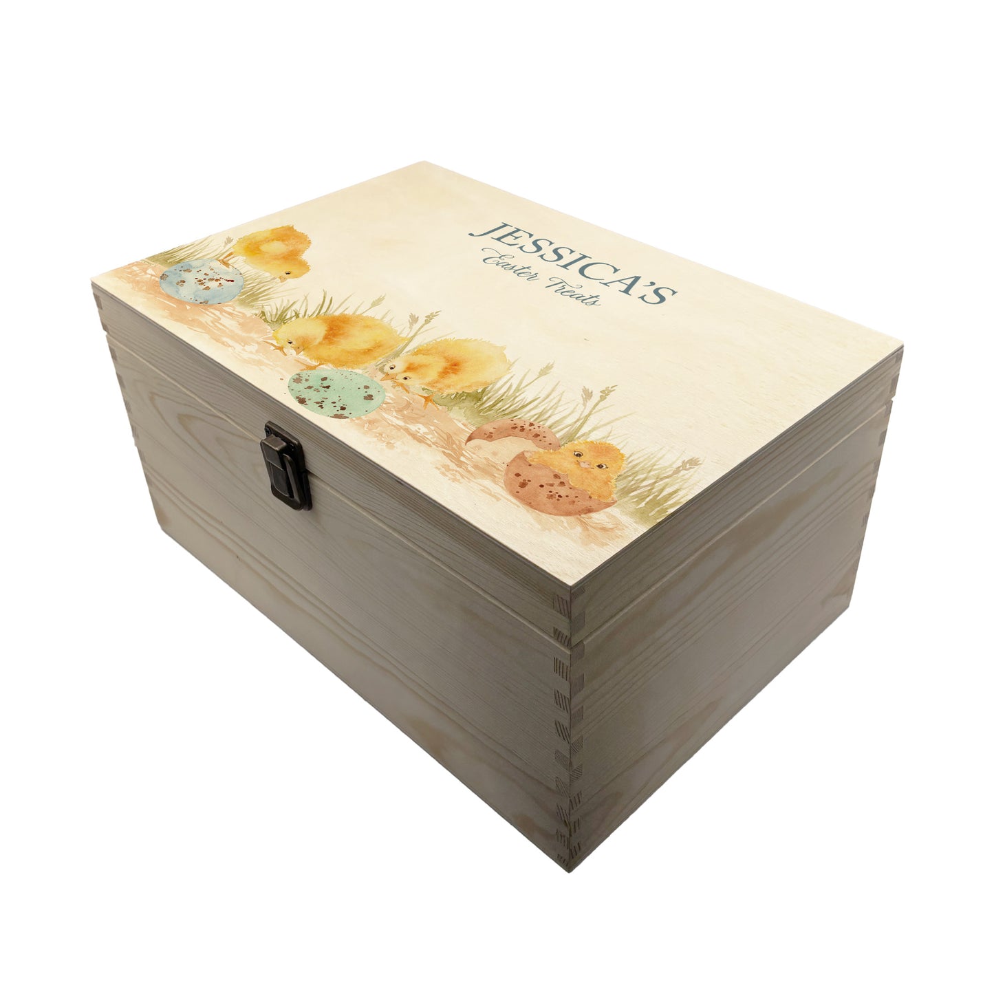 This wooden keepsake box is a large Easter box, perfect for creating a box full of Easter eggs and treats. The box is great for storing keepsakes in once the Easter treats have been eaten. This design has 4 chicks, one has a chick that has just hatched and the other 3 are looking at the pastel colour easter eggs on the floor  wondering if any more chicks may hatch or not. This gift box is perfect for filling with lots of easter treats. 