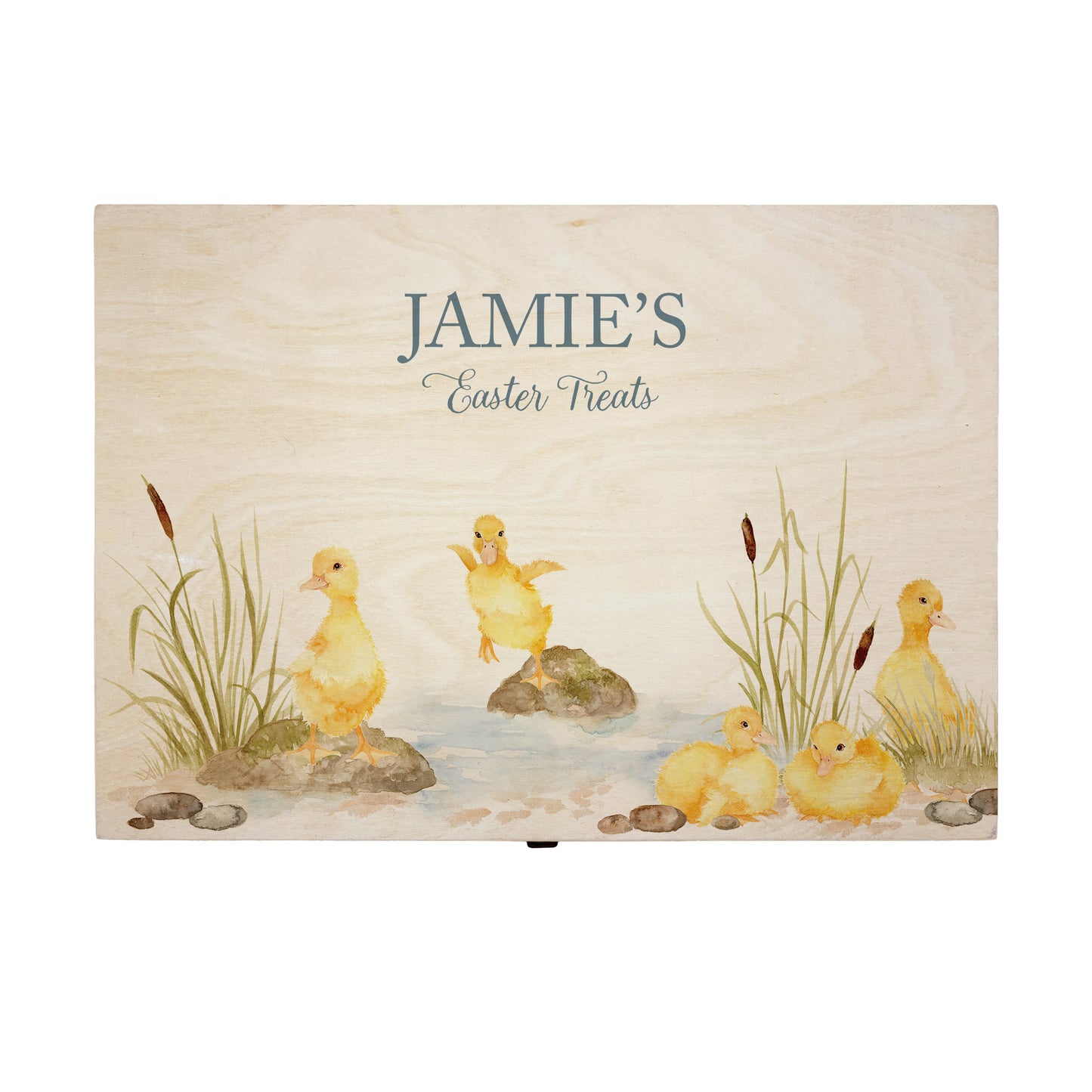 Large Easter personalised wooden pine box, perfect for Easter treats, eggs, gifting. Children gifts. This box has a beautiful easter theme with 5 fluffy ducklings playing in a pond area, surrounded by reeds and pebbles. This box can be personalised in 4 phrases or it can just have the design and no text. 