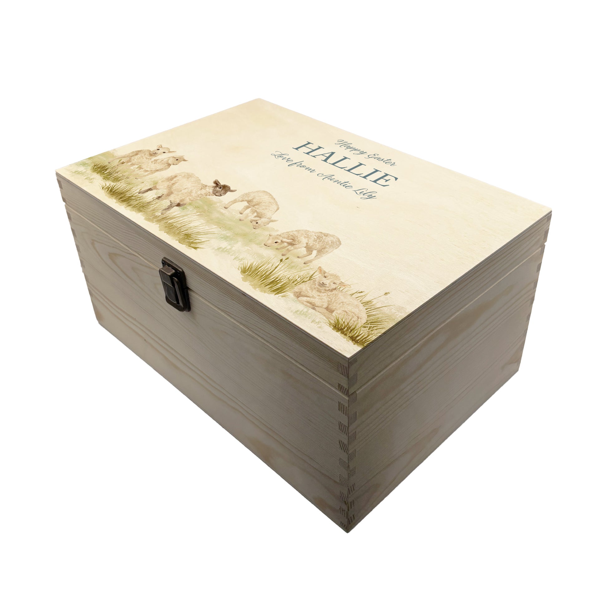 Large Easter personalised wooden pine box, perfect for Easter treats, eggs, gifting. Children gifts. This box has a beautiful easter theme of 6 Lambs grazing in the spring Meadow  This box can be personalised in 4 phrases or it can just have the design and no text. 