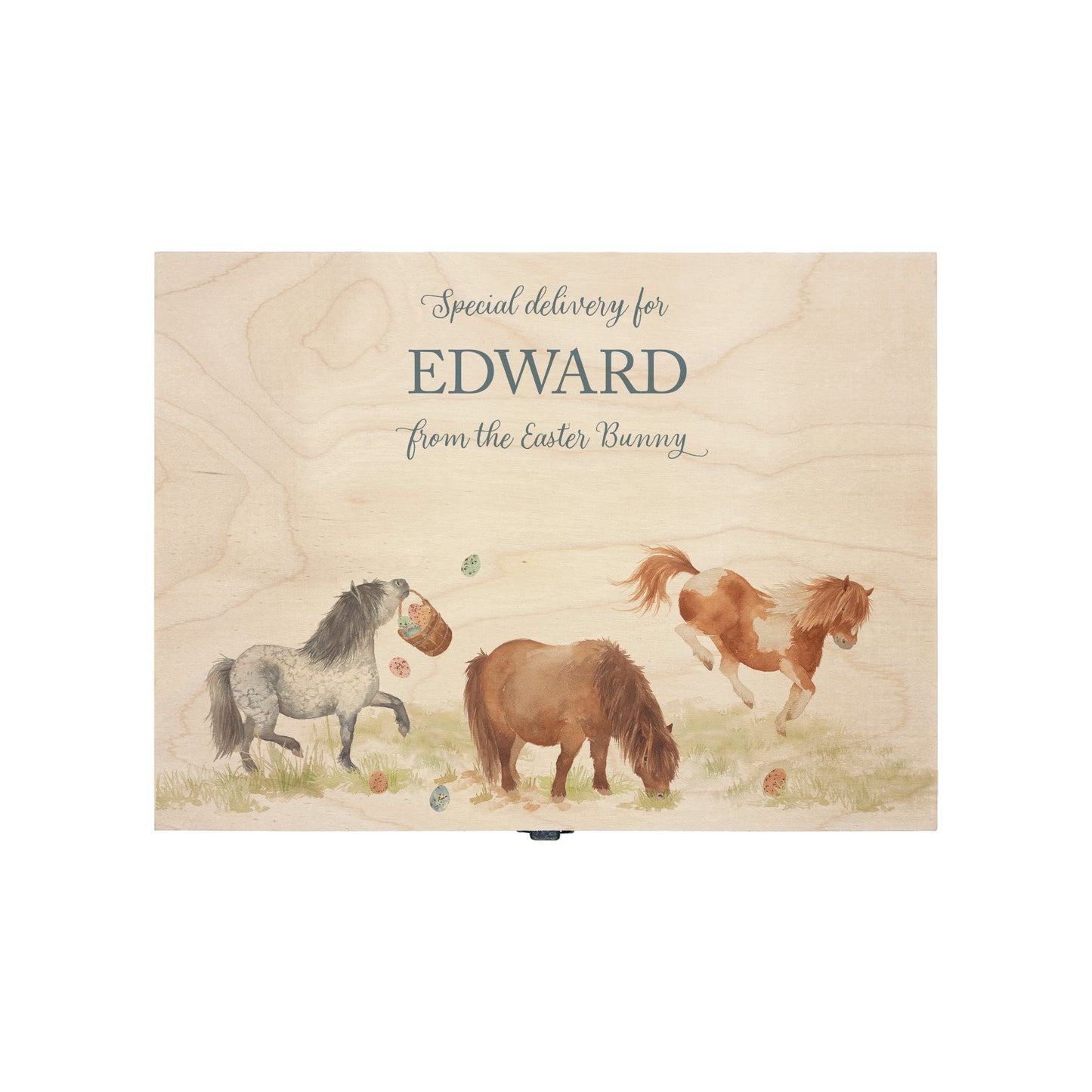 This Easter medium wooden gift box box has 3 Shetland ponies running around a spring meadow. One Shetland is swinging a bucket full of pastel easter eggs which has flung all over the meadow. another is bucking and having lots of fun another is grazing and the other is stood watching. These easter boxes are great for gifting and filling full of easter treats for your loved ones, children, parents and friends. Great keeps sake to keep. 