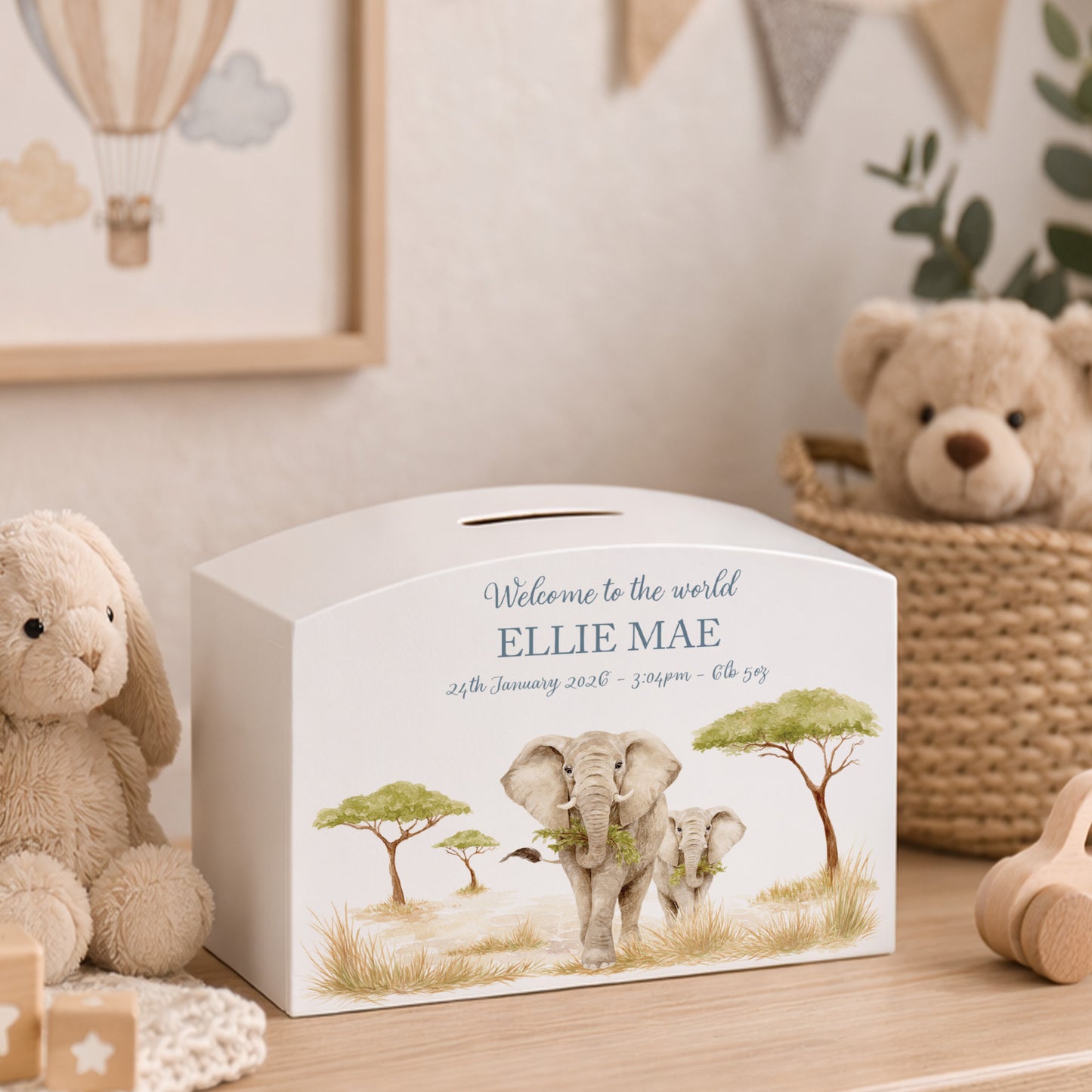 Safari themed babies money box, Featuring mum and baby elephant in a water colour theme. 