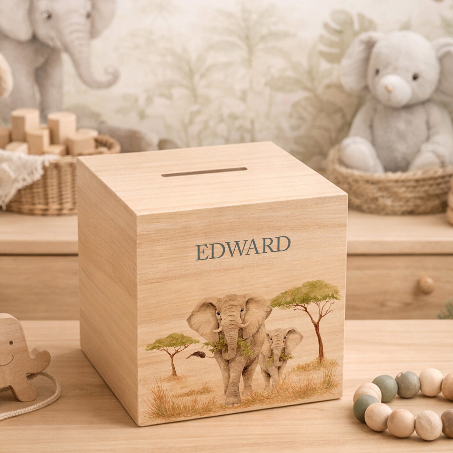 handmade personalised nursery money box with soft watercolour artwork, mummy and baby elephant strolling through the Savanah